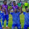 Joueurs de Port City FC célébrant sur la pelouse