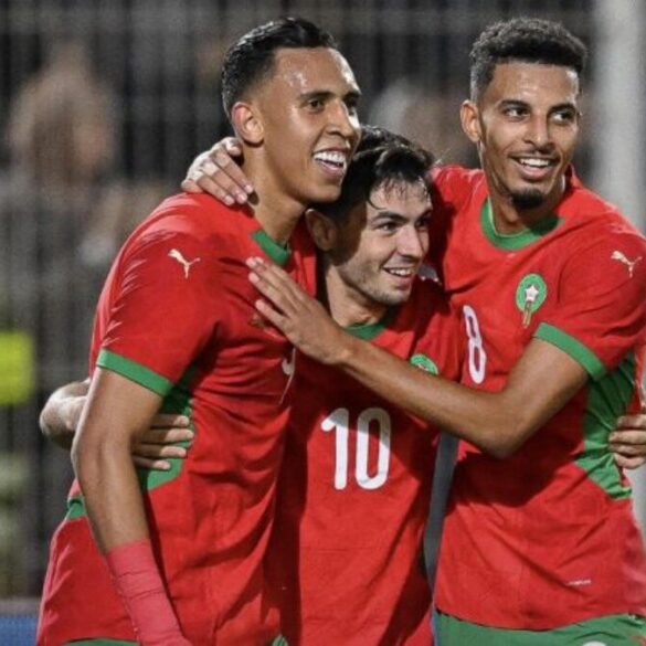 Joueurs du Maroc célébrant avec les Lions de l’Atlas